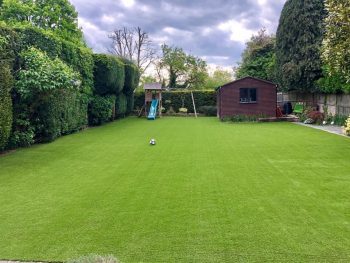 artificial grass garden with shed